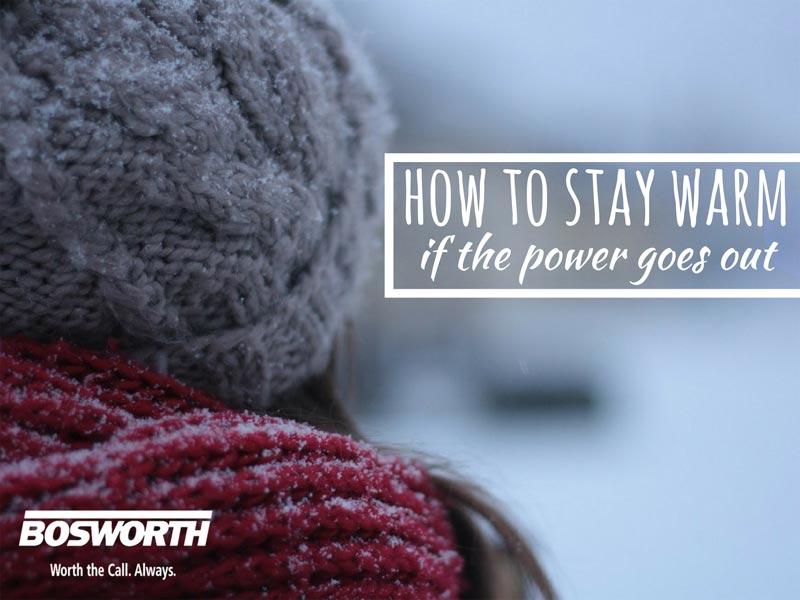 Person wearing a knitted hat and scarf with snowflakes, titled "How to Stay Warm if the Power Goes Out," promoting winter safety tips from The Bosworth Company.
